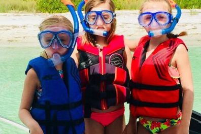 a group of people posing for the camera