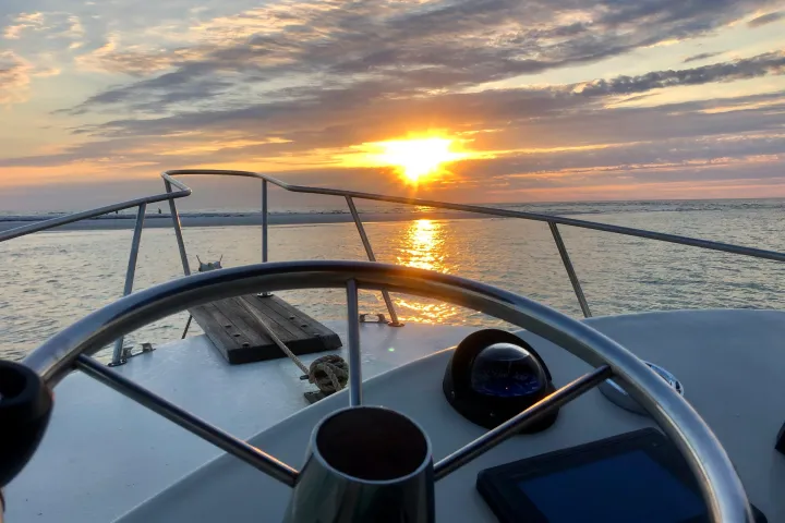 a sunset over a body of water