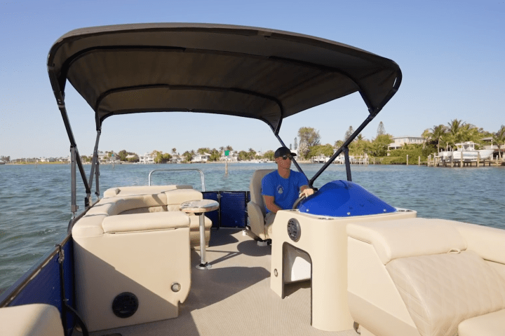 a boat sitting on top of a body of water