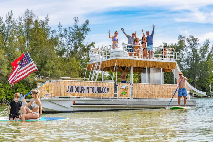 a group of people on a boat in the water